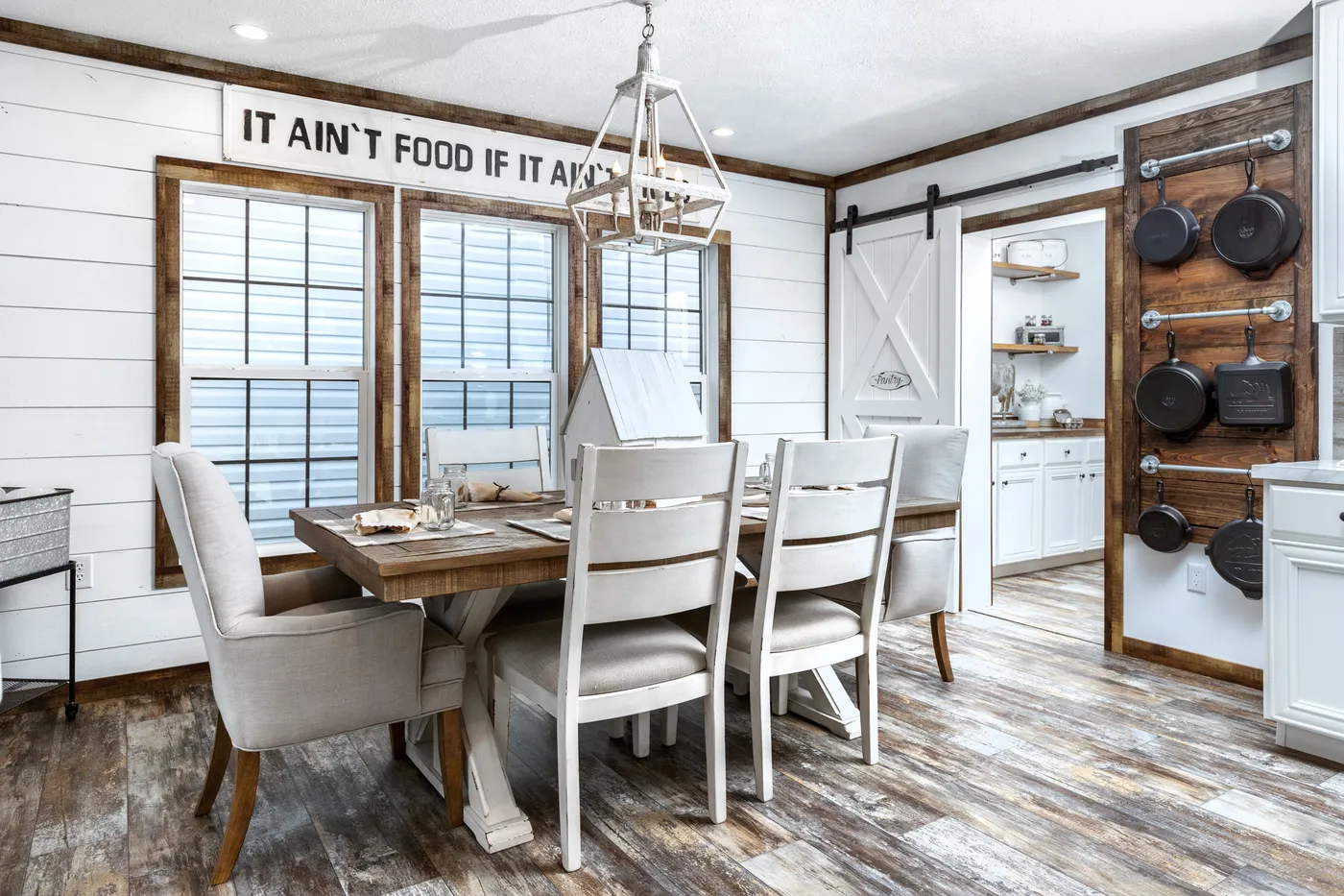 The THE LIZA JANE Dining Room. This Manufactured Mobile Home features 3 bedrooms and 2 baths.