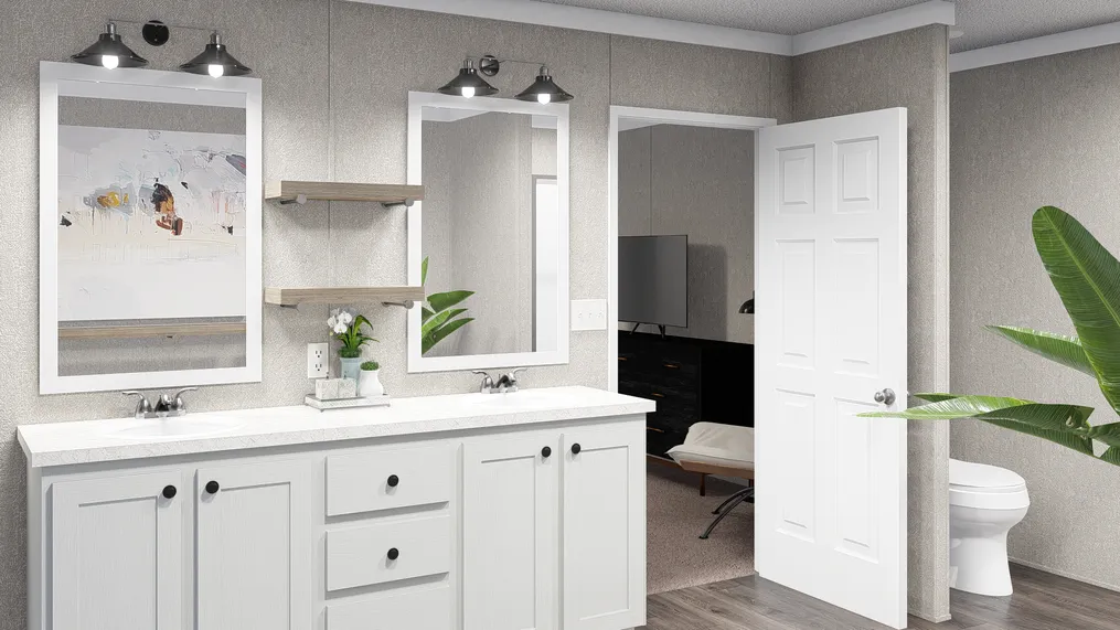 The THE FUSION 32H Primary Bathroom. This Manufactured Mobile Home features 5 bedrooms and 3 baths.