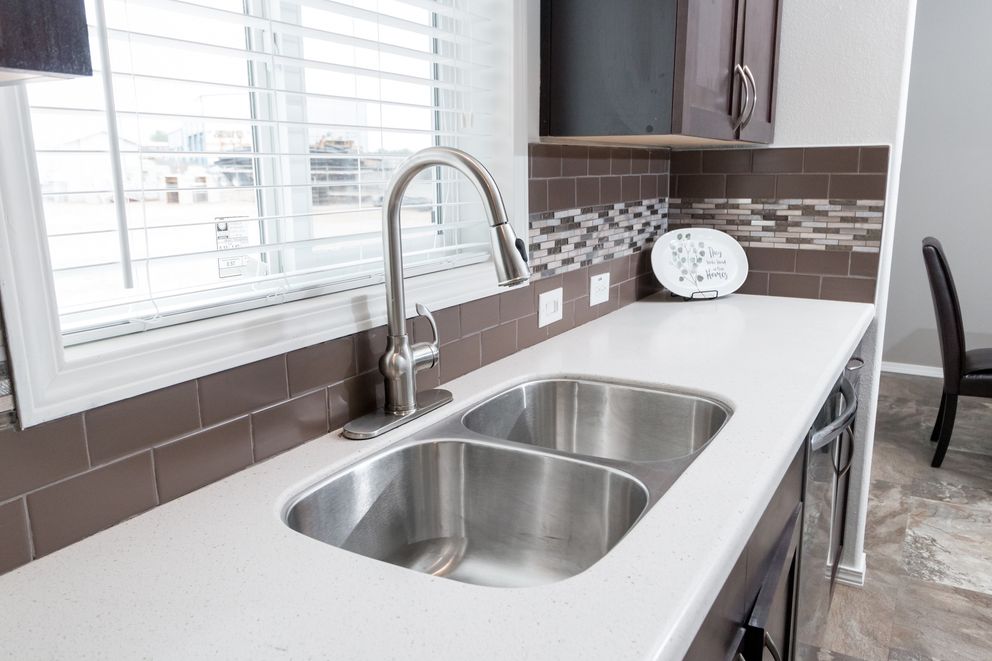 The K3060A Kitchen. This Manufactured Mobile Home features 3 bedrooms and 2 baths.