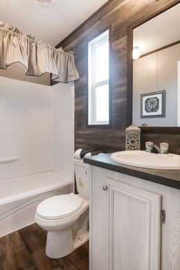 The THE SEASIDE Guest Bathroom. This Manufactured Mobile Home features 3 bedrooms and 2 baths.