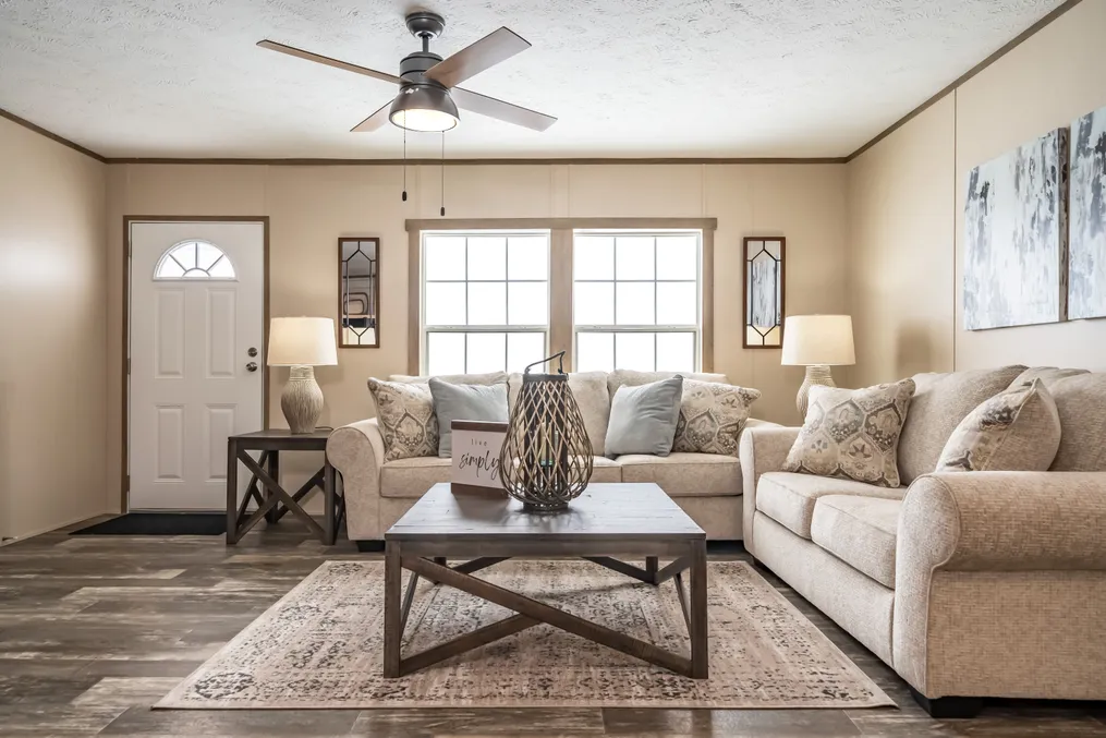 The ULTRA PRO 56B Living Room. This Manufactured Mobile Home features 3 bedrooms and 2 baths.