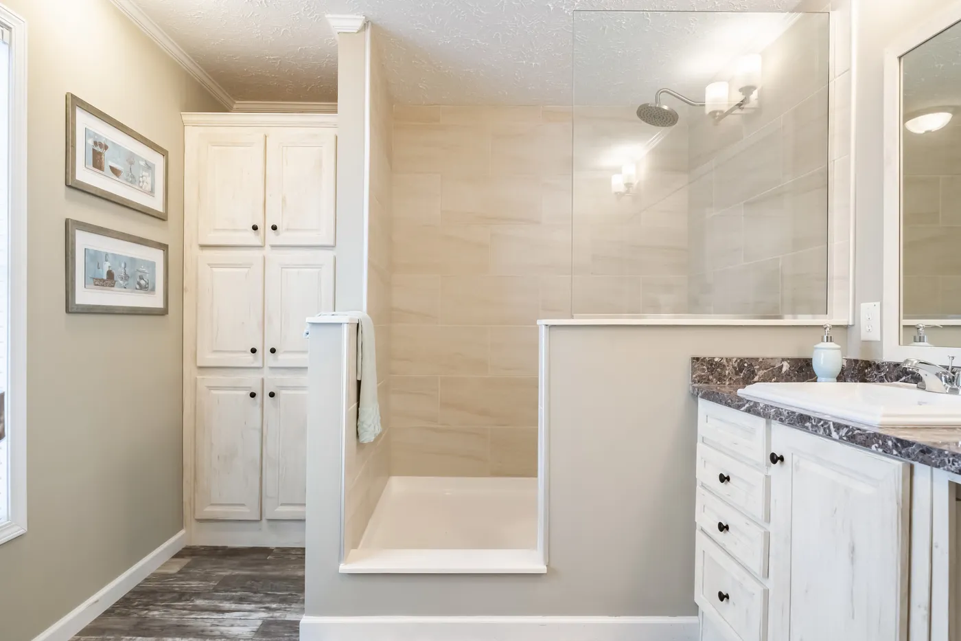 The 4608 ROCKETEER 5628 Primary Bathroom. This Manufactured Mobile Home features 3 bedrooms and 2 baths.