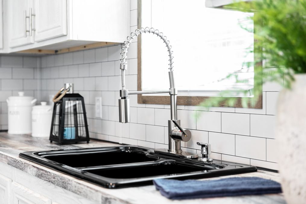 The THE MORRIS Kitchen. This Manufactured Mobile Home features 3 bedrooms and 2 baths.