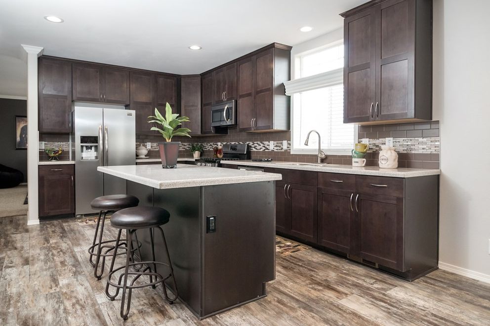 The ENCHANTMENT 3070A Kitchen. This Manufactured Mobile Home features 3 bedrooms and 2 baths.