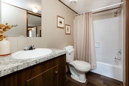 The GRAND Guest Bathroom. This Manufactured Mobile Home features 4 bedrooms and 2 baths.