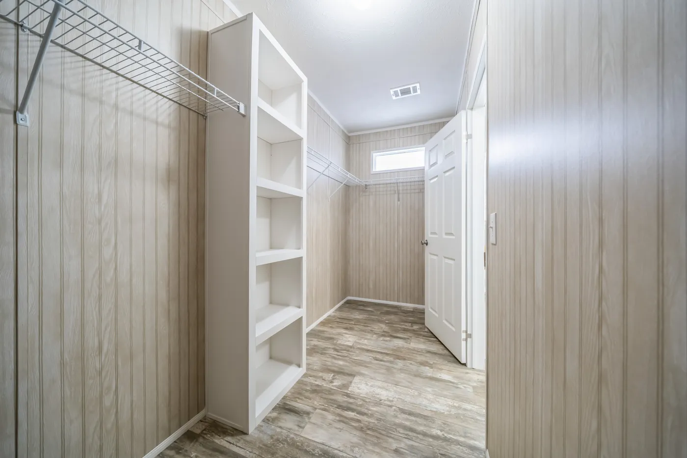 The THE INGRAM Storage. This Manufactured Mobile Home features 3 bedrooms and 2 baths.