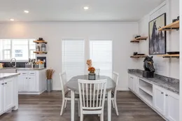 The 1454 CAROLINA Dining Area. This Manufactured Mobile Home features 4 bedrooms and 2 baths.