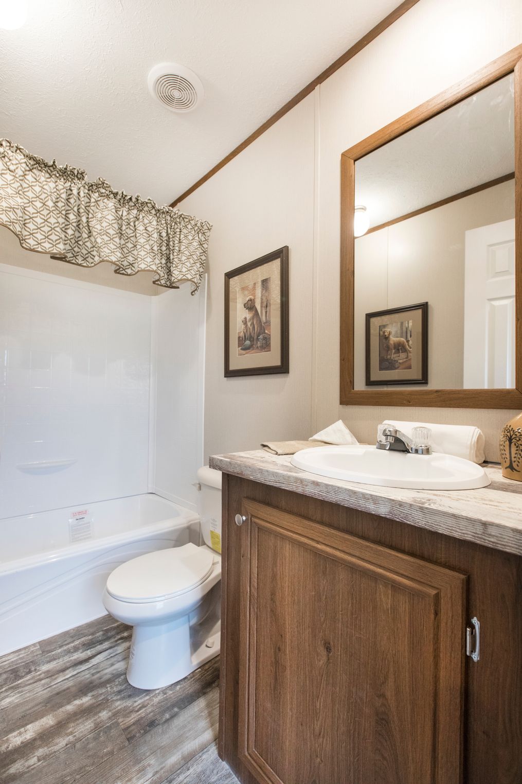 The THE LODGE Guest Bathroom. This Manufactured Mobile Home features 2 bedrooms and 2 baths.