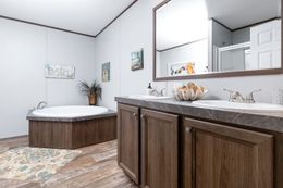 The CRAZY EIGHTS Master Bathroom. This Manufactured Mobile Home features 4 bedrooms and 2 baths.
