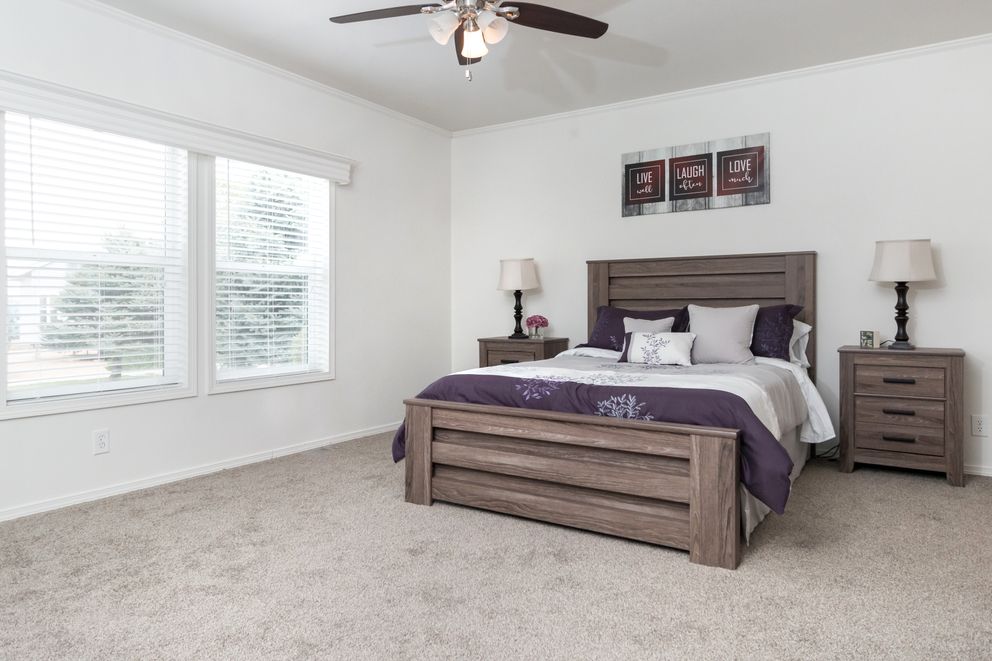 The K3060A Primary Bedroom. This Manufactured Mobile Home features 3 bedrooms and 2 baths.