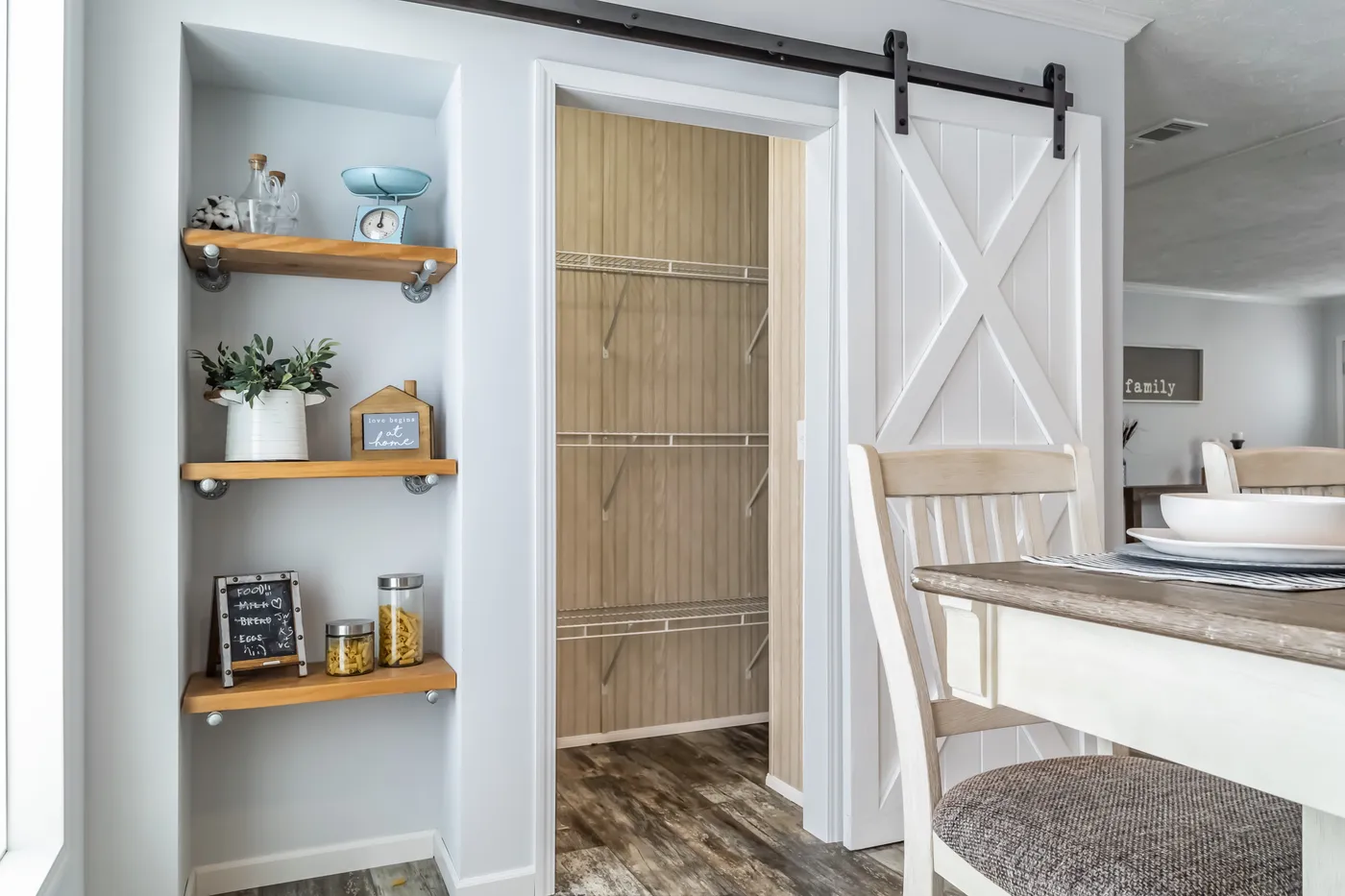 The THE LEAHY Dining Area. This Manufactured Mobile Home features 4 bedrooms and 2 baths.