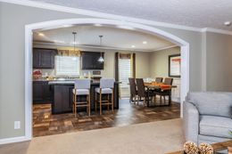 The 5604 ENTERPRISE 4 6428 Living Room. This Manufactured Mobile Home features 3 bedrooms and 2 baths.