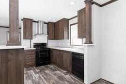 The THE POWERHOUSE Kitchen. This Manufactured Mobile Home features 3 bedrooms and 2 baths.