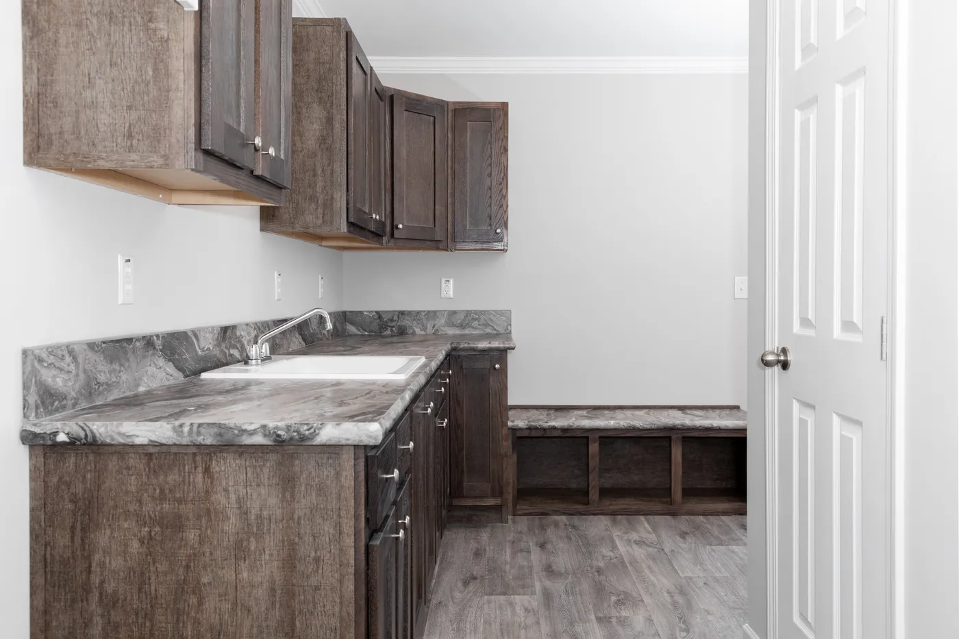 The THE VILLETTE Utility Room. This Manufactured Mobile Home features 3 bedrooms and 2 baths.