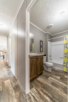 The TRADITION 2868B Guest Bathroom. This Manufactured Mobile Home features 4 bedrooms and 2 baths.