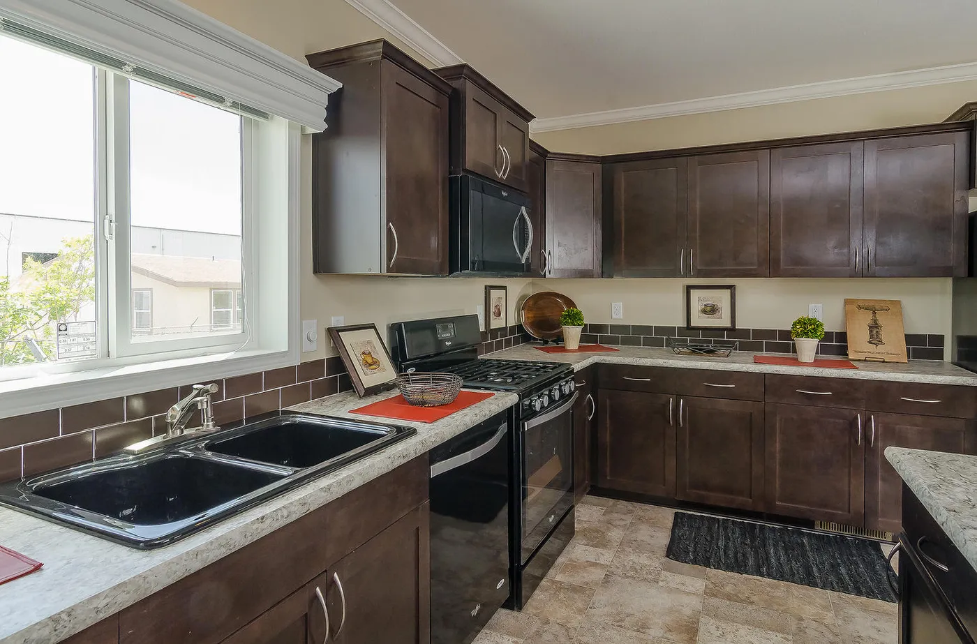 The K3076A Kitchen. This Manufactured Mobile Home features 4 bedrooms and 2 baths.