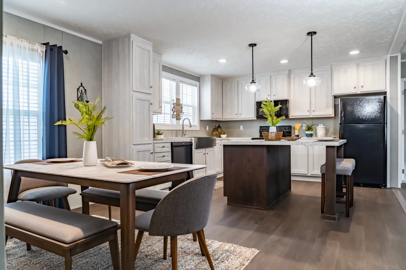 The ULTRA BREEZE 52 Dining Area. This Manufactured Mobile Home features 3 bedrooms and 2 baths.