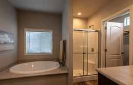 The K1676H Primary Bathroom. This Manufactured Mobile Home features 3 bedrooms and 2 baths.