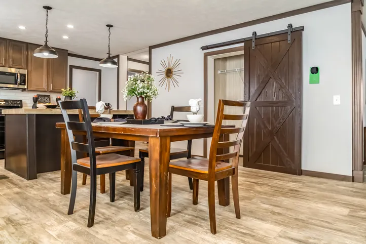 The THE TURNER Dining Room. This Manufactured Mobile Home features 3 bedrooms and 2 baths.