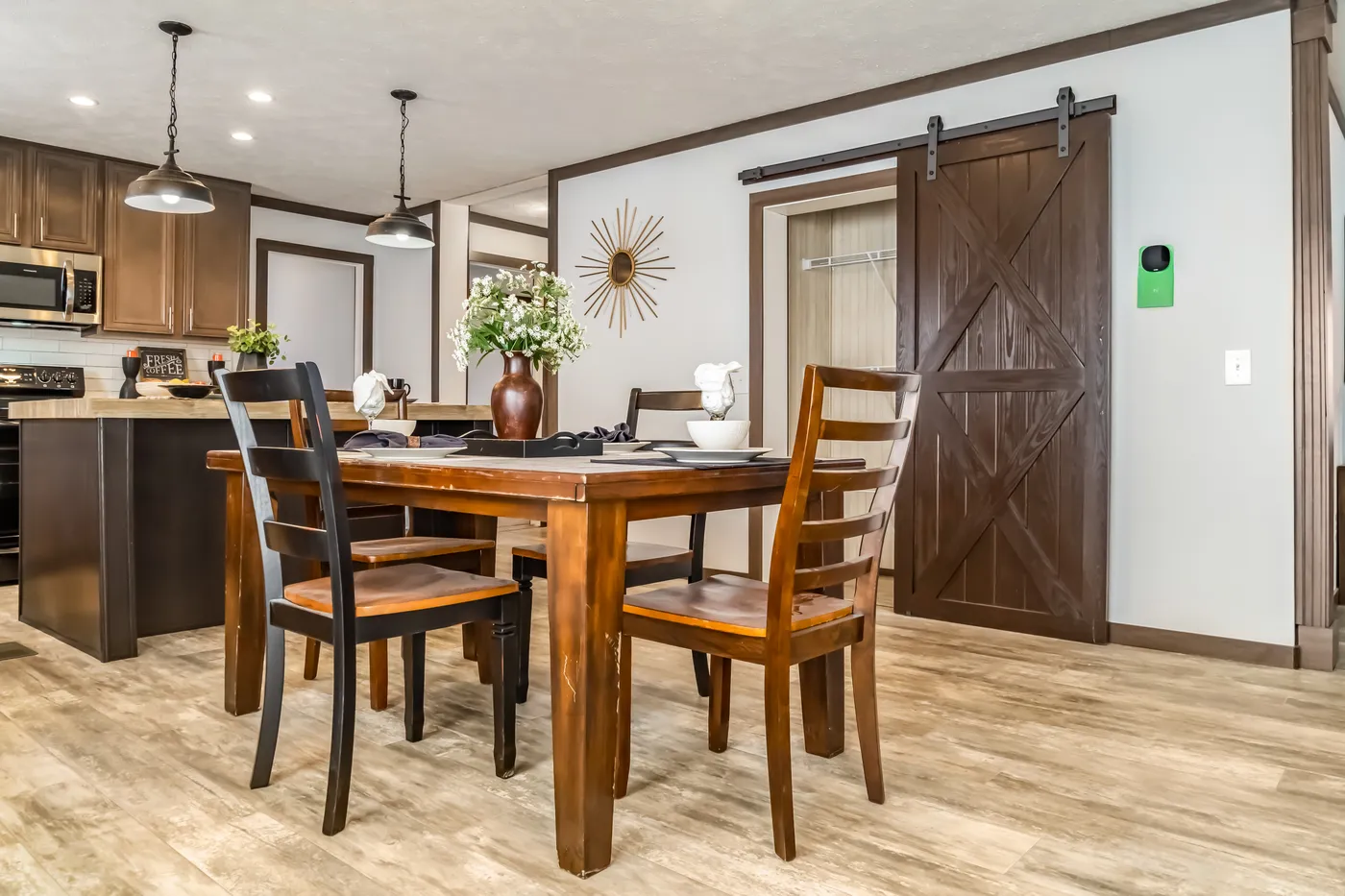 The THE TURNER Dining Room. This Manufactured Mobile Home features 3 bedrooms and 2 baths.
