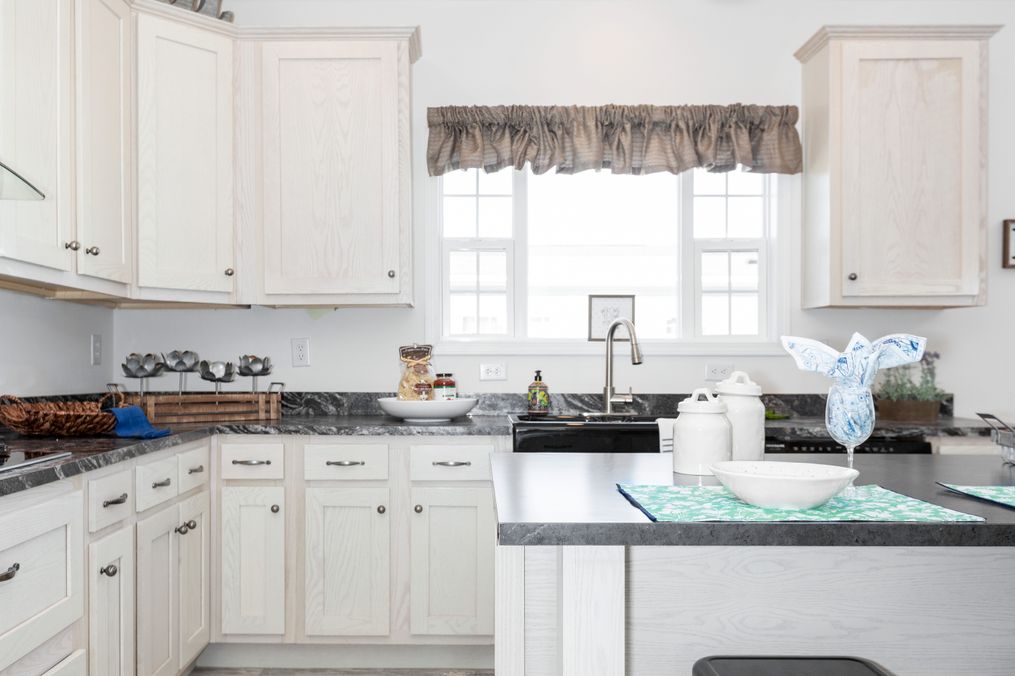 The 2095 HERITAGE Kitchen. This Manufactured Mobile Home features 3 bedrooms and 2 baths.