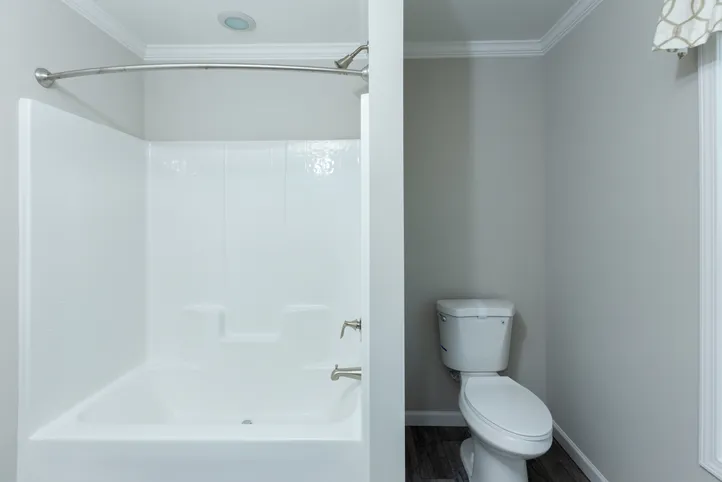 The THE FREEDOM BREEZE Guest Bathroom. This Manufactured Mobile Home features 3 bedrooms and 2 baths.