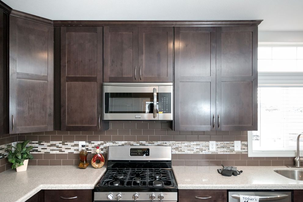 The ENCHANTMENT 3070A Kitchen. This Manufactured Mobile Home features 3 bedrooms and 2 baths.