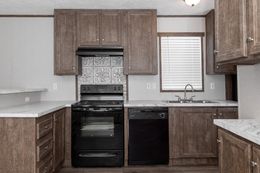 The BLAZER 66 B Kitchen. This Manufactured Mobile Home features 3 bedrooms and 2 baths.