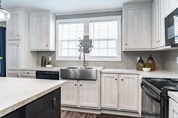The ULTRA BREEZE 52 Kitchen. This Manufactured Mobile Home features 3 bedrooms and 2 baths.