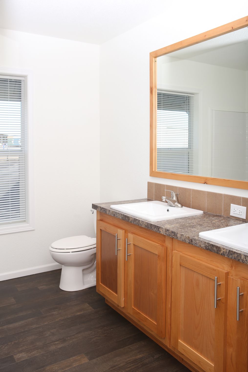 The INDIGO Guest Bathroom. This Manufactured Mobile Home features 3 bedrooms and 2 baths.