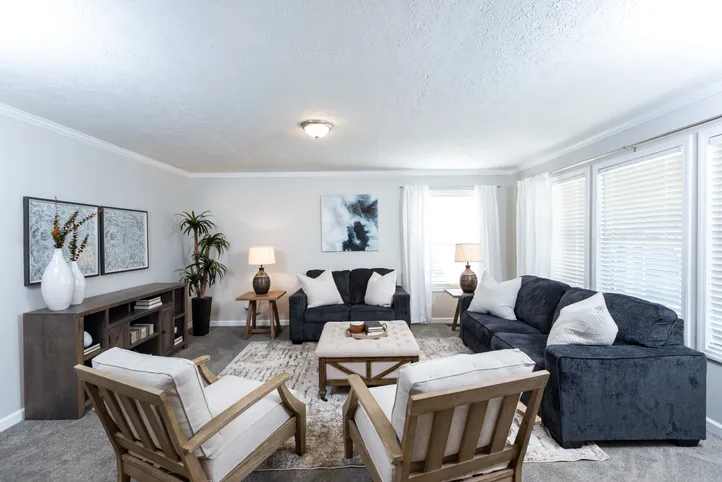 The KEENELAND Living Room. This Manufactured Mobile Home features 3 bedrooms and 2 baths.