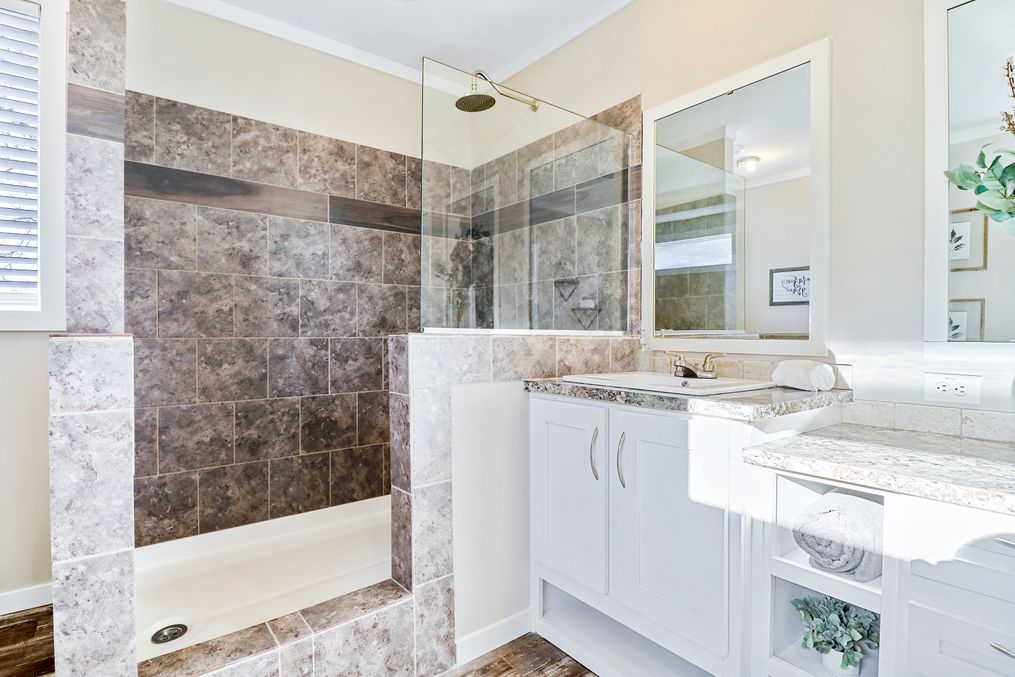 The THE TAHOE Primary Bathroom. This Manufactured Mobile Home features 3 bedrooms and 2 baths.