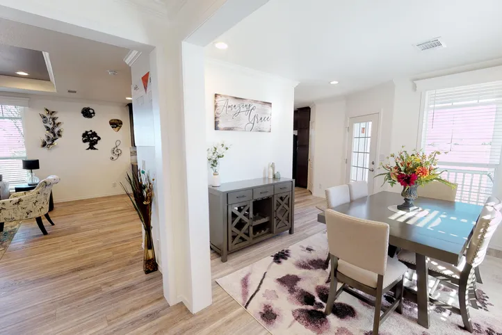 The SUM3068A Dining Area. This Manufactured Mobile Home features 3 bedrooms and 2 baths.