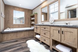 The EMMELINE Primary Bathroom. This Manufactured Mobile Home features 4 bedrooms and 2 baths.