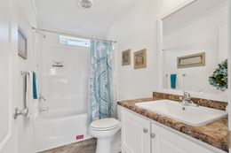 The FULTON 6028-2557D Guest Bathroom. This Manufactured Mobile Home features 3 bedrooms and 2 baths.