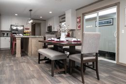 The FARMHOUSE 4 Dining Area. This Manufactured Mobile Home features 4 bedrooms and 2 baths.