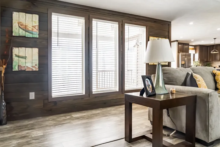 The THE TURNER Living Room. This Manufactured Mobile Home features 3 bedrooms and 2 baths.