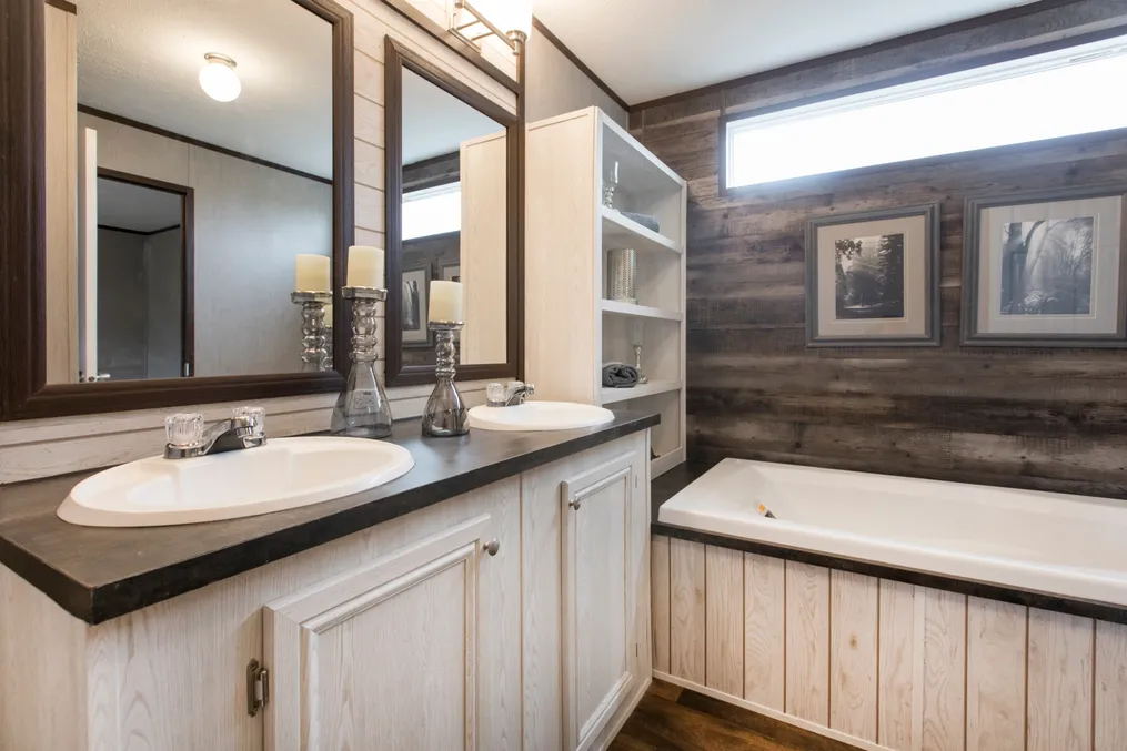 The THE SEASIDE Primary Bathroom. This Manufactured Mobile Home features 3 bedrooms and 2 baths.