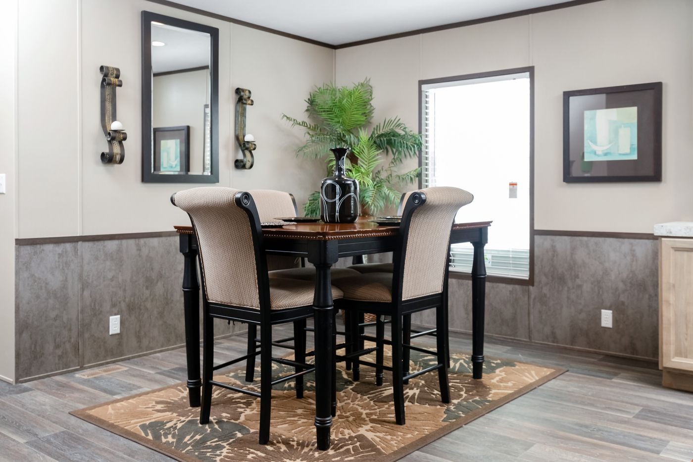 The PT 78 Dining Room. This Manufactured Mobile Home features 3 bedrooms and 2 baths.