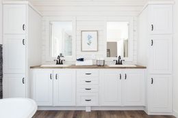 The 1434 CAROLINA "SOUTHERN BELLE" Primary Bathroom. This Manufactured Mobile Home features 3 bedrooms and 2 baths.
