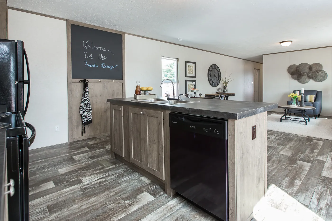 The THE BREEZE Kitchen. This Manufactured Mobile Home features 3 bedrooms and 2 baths.