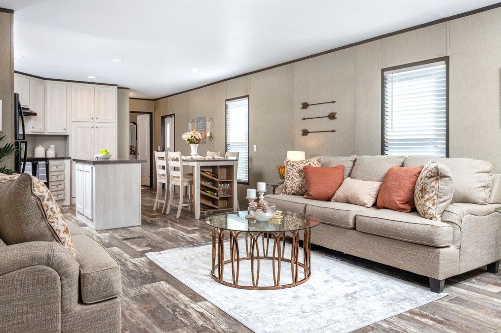 The CHALLENGER 16763B Living Room. This Manufactured Mobile Home features 3 bedrooms and 2 baths.