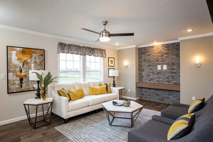 The THE FREEDOM SOHO Living Room. This Manufactured Mobile Home features 3 bedrooms and 2 baths.