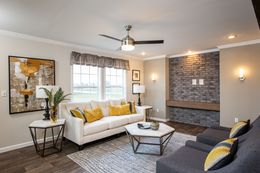The THE FREEDOM SOHO Living Room. This Manufactured Mobile Home features 3 bedrooms and 2 baths.