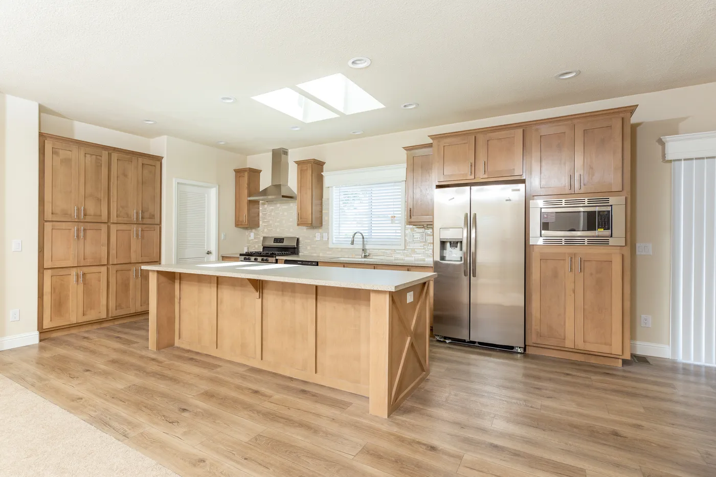 The CORONADO 2458C Kitchen. This Manufactured Mobile Home features 3 bedrooms and 2 baths.