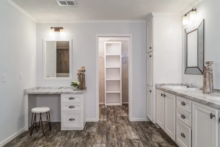 The THE LEAHY Primary Bathroom. This Manufactured Mobile Home features 4 bedrooms and 2 baths.