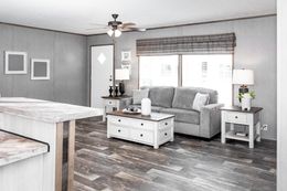 The THE MORRIS Living Room. This Manufactured Mobile Home features 3 bedrooms and 2 baths.