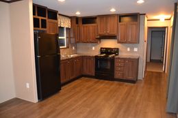 The MAPLE 7014-660 Kitchen. This Manufactured Mobile Home features 3 bedrooms and 2 baths.