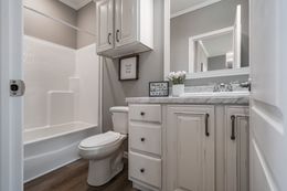 The THE ABIGAIL Guest Bathroom. This Manufactured Mobile Home features 3 bedrooms and 2 baths.