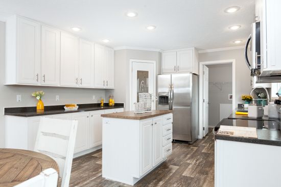 The SANTA FE 684A Kitchen. This Manufactured Mobile Home features 4 bedrooms and 2 baths.